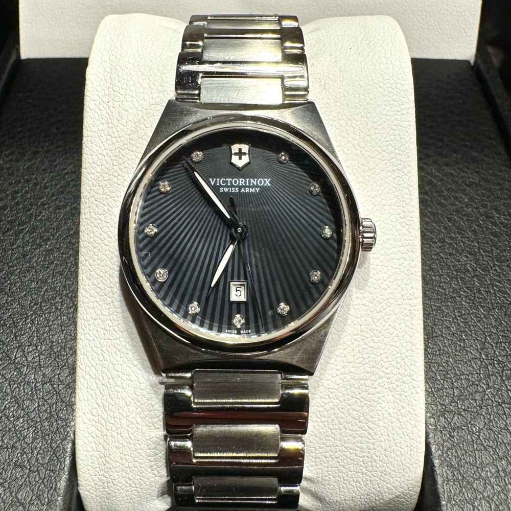 Victorinox - Swiss Army watch, navy blue dial.